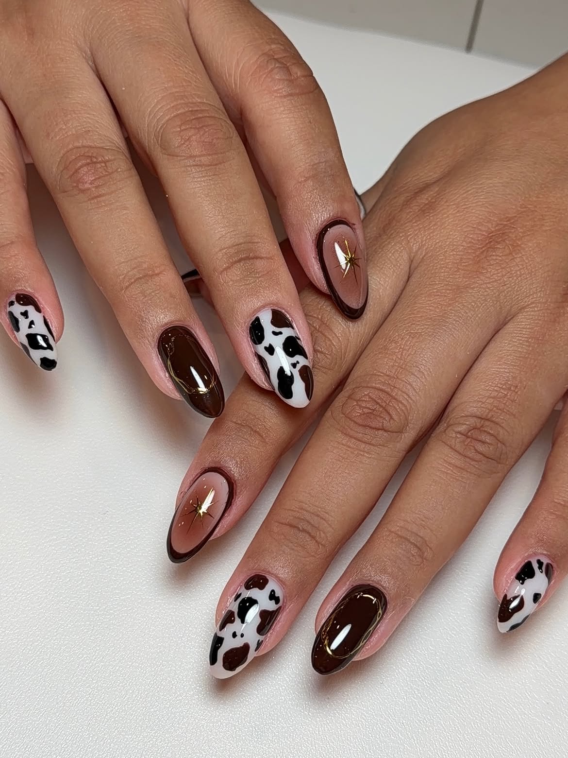 Cow Print Ombre Almond Nails with Gold Accent