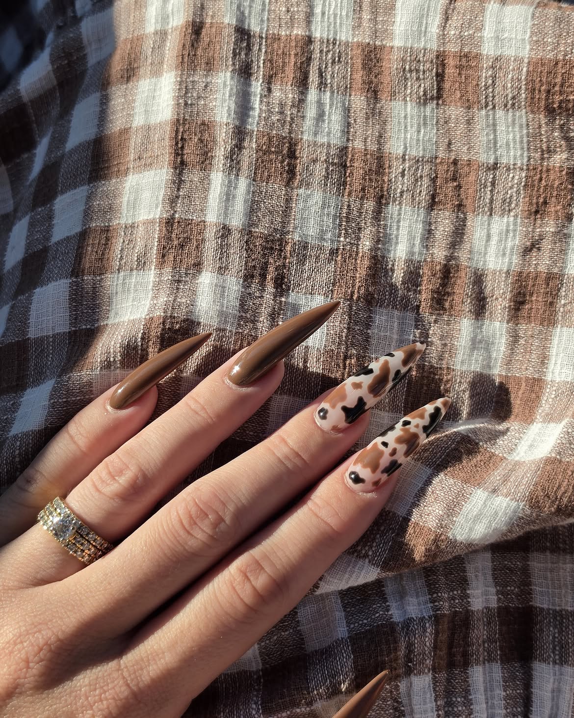 Cow Print Stiletto Nails with Chocolate Brown Accents
