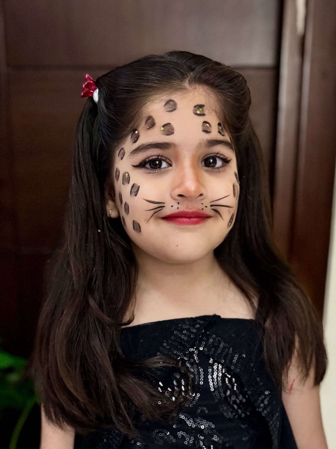 Cute Leopard Face With Wavy Dark Hair