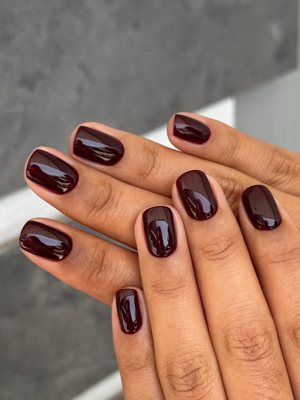 Deep Burgundy Glossy Short Oval Nails