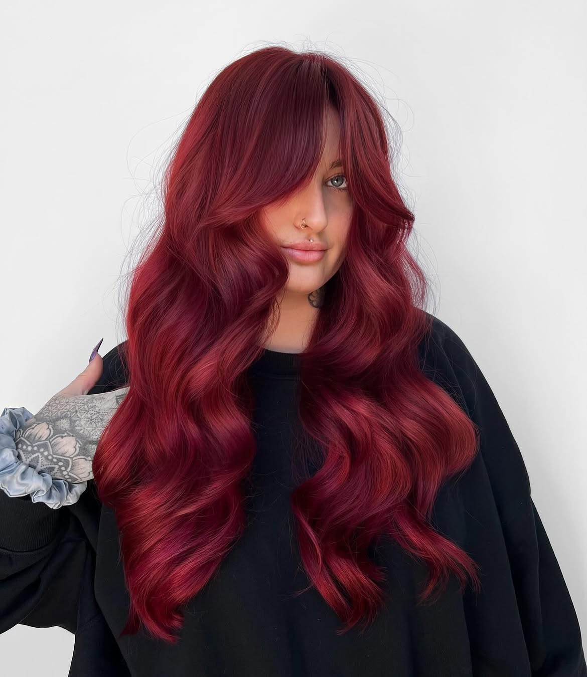 Deep Cherry Red Waves With Face-Framing Layers
