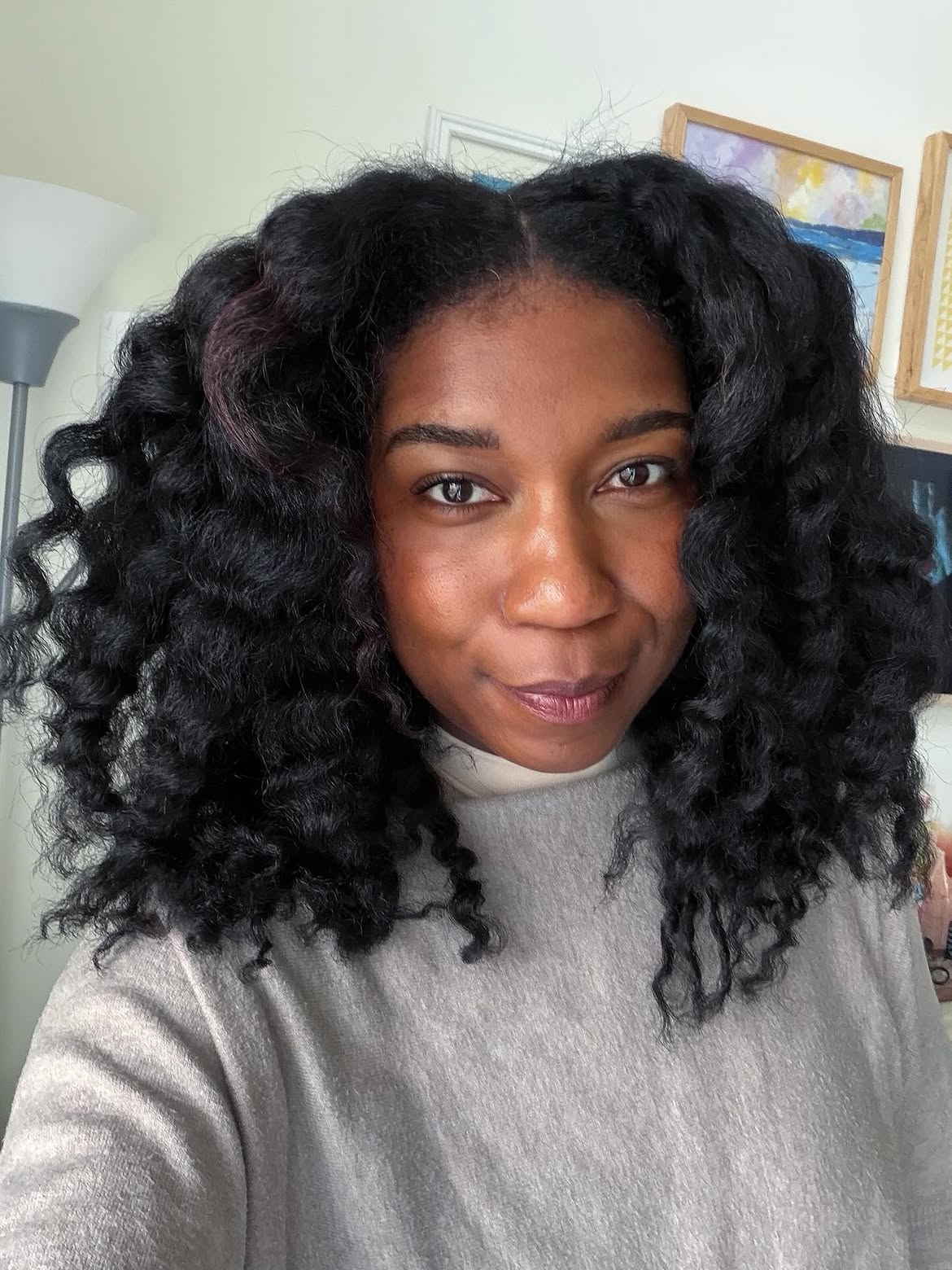 Deep Conditioned Curls With Subtle Plum Highlights