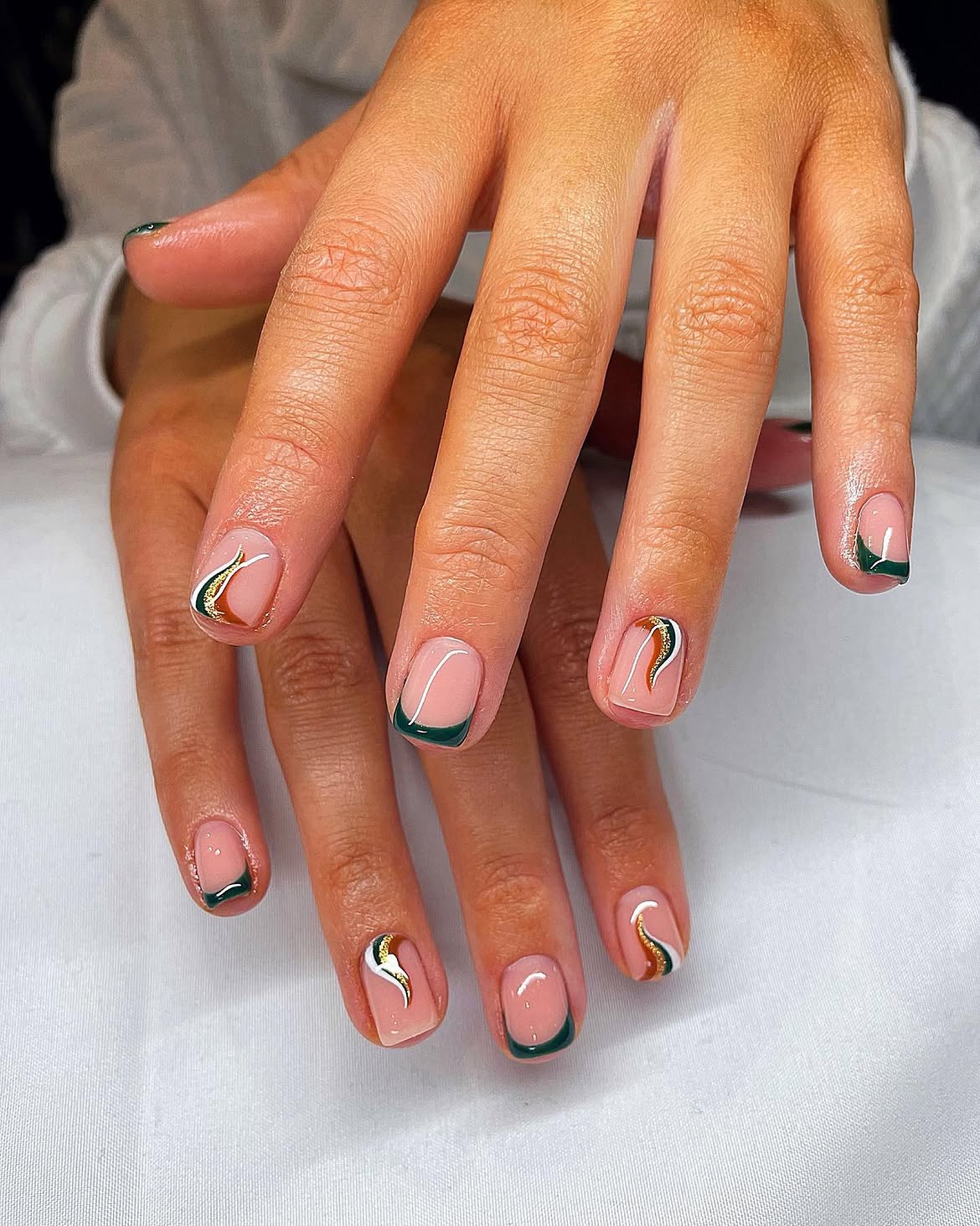 Deep Emerald French Tip Swirl Nails