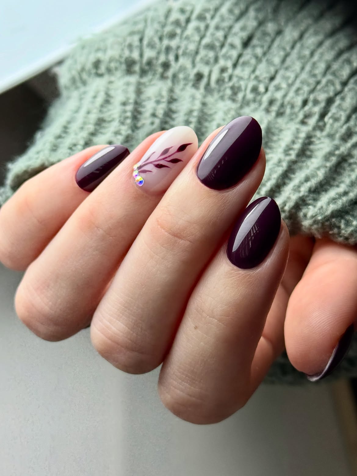 Deep Plum Almond Nails with Floral Accent