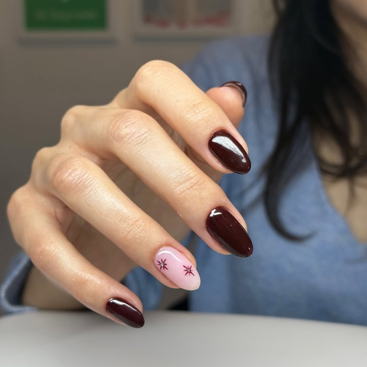 Deep Wine Oval Nails with Pink Star Accent