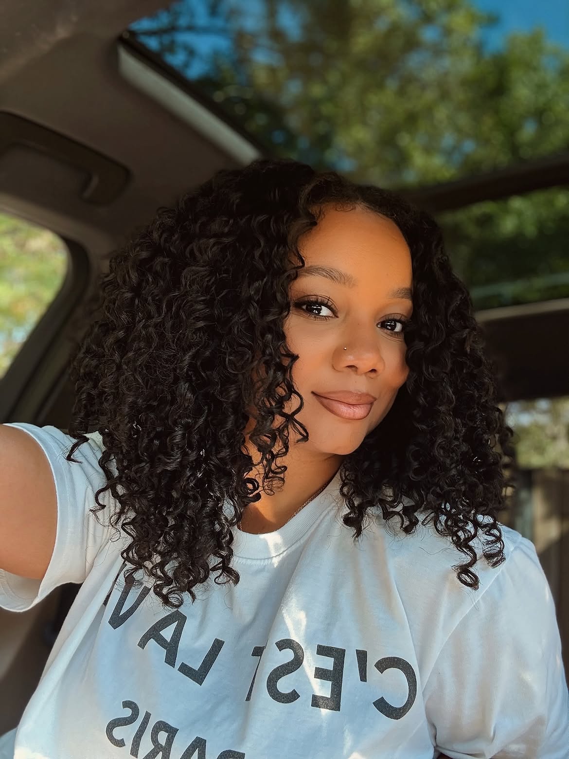 Defined Curly Lob With Subtle Face-Framing Layers