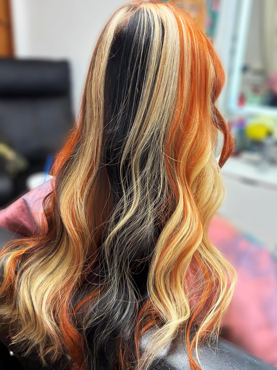 Dramatic Black, Blonde, and Copper Peekaboo Hair
