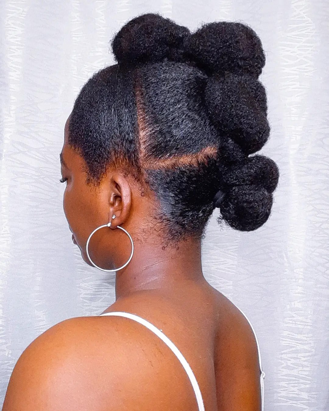 Dramatic Bubble Updo With Defined Parts