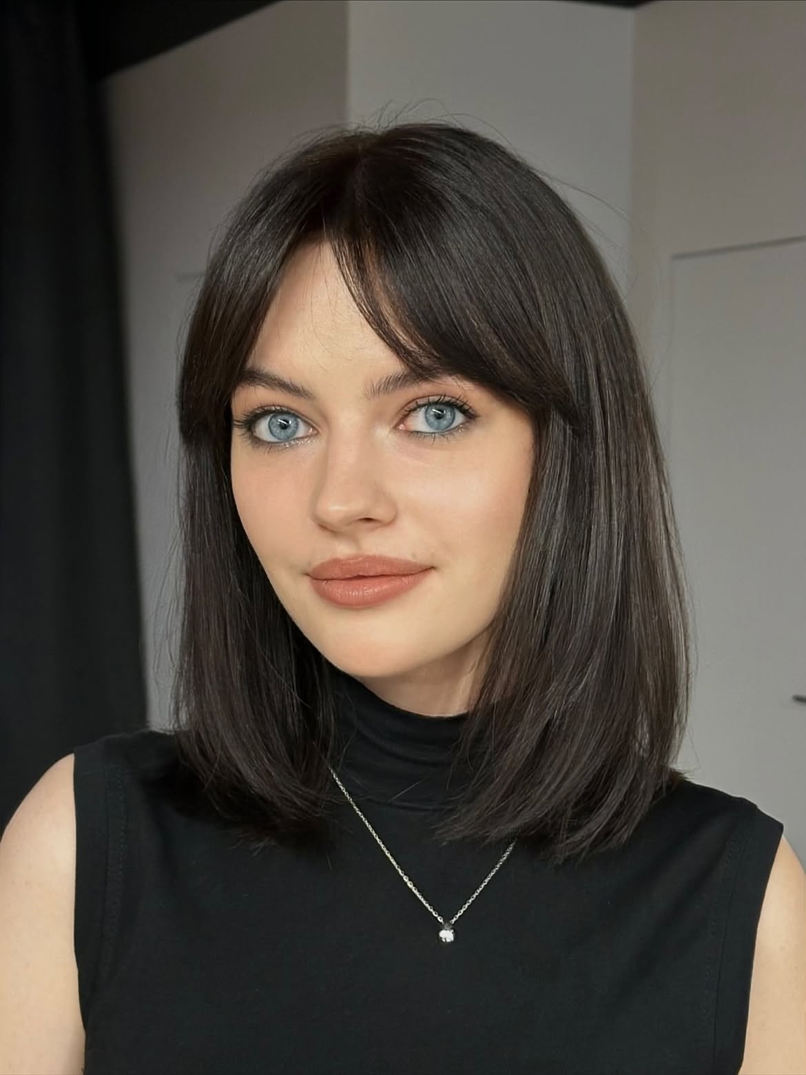 Effortless Dark Brown Collarbone Bob With Wispy Bangs