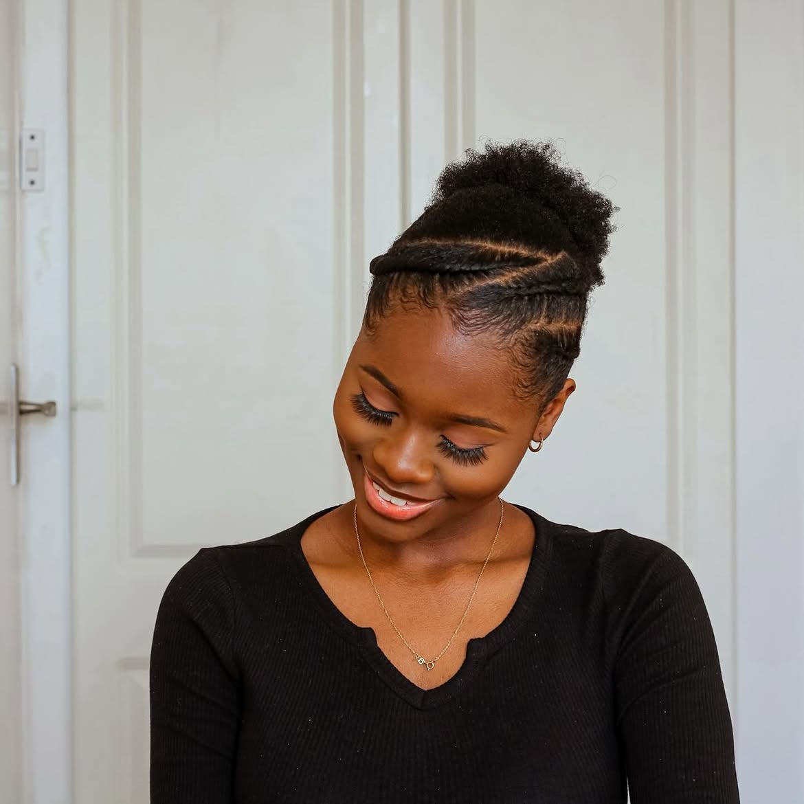 Elegant Braided Updo With Textured Top Knot