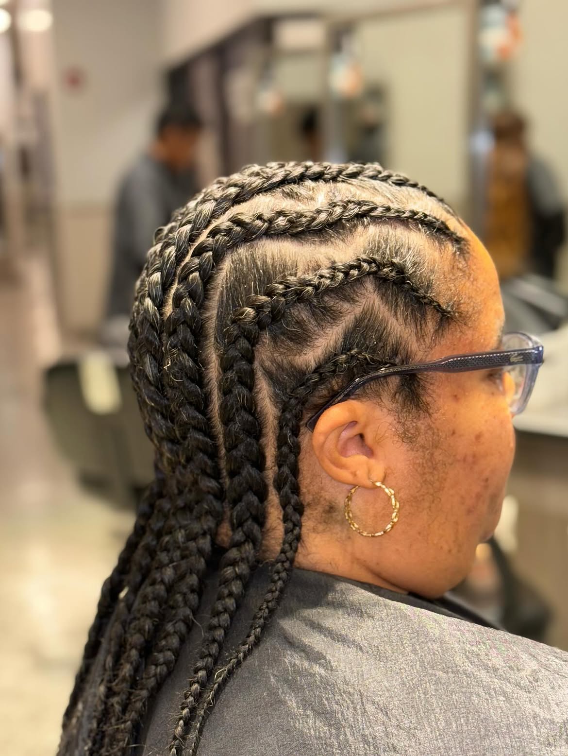 Elegant Cornrows With Draping Braids
