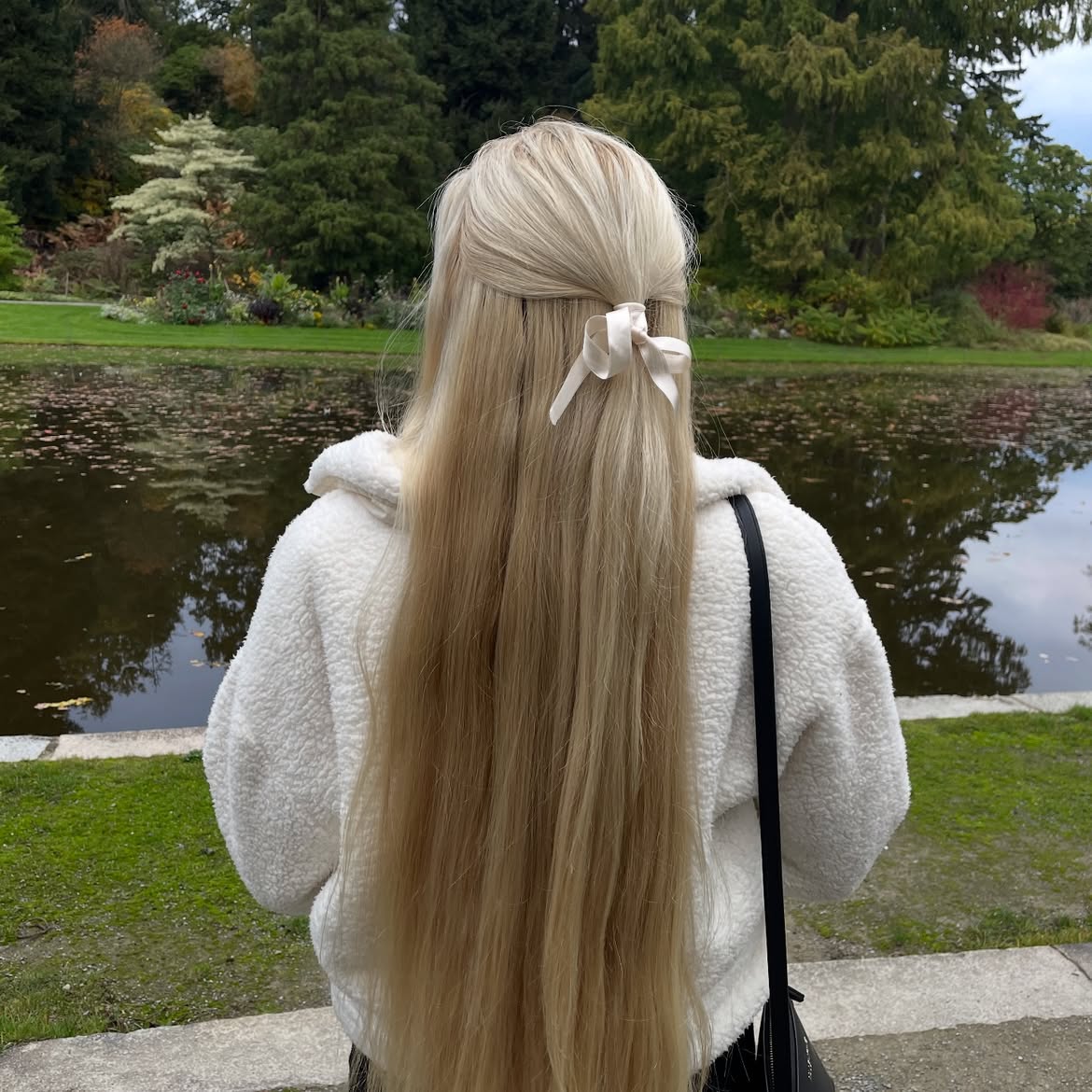 Elegant Half-Up Style With Peach Satin Bow