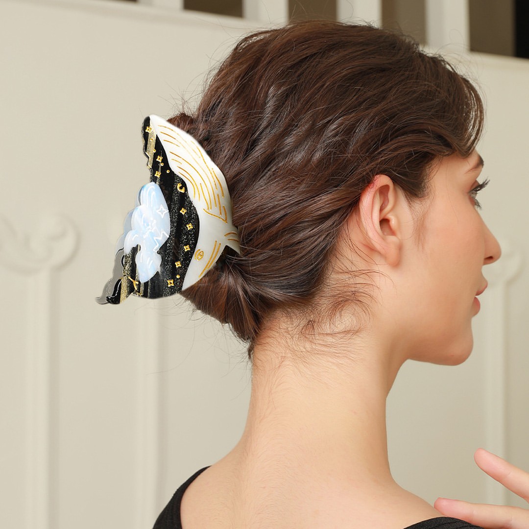 Elegant Low Chignon With Statement Butterfly Clip
