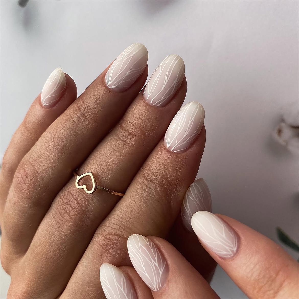 Ethereal White Line Art Almond Nails