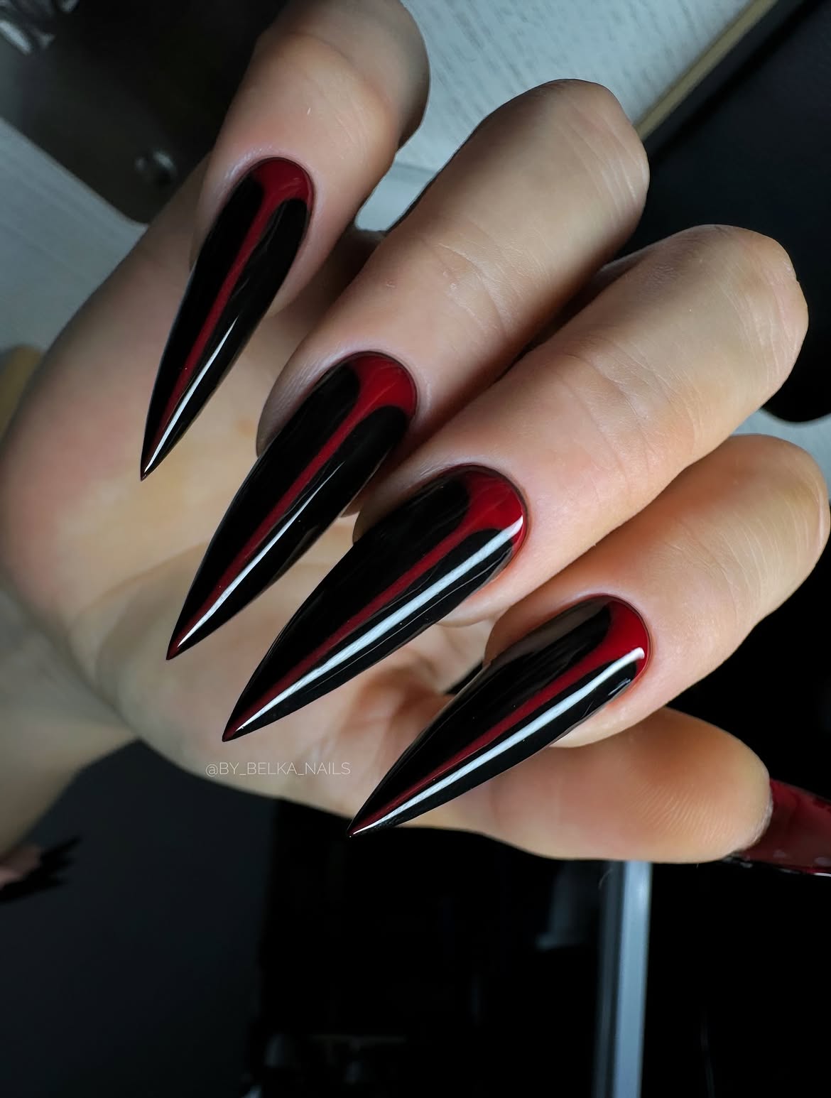 Fiery Red And Black Stiletto Nails