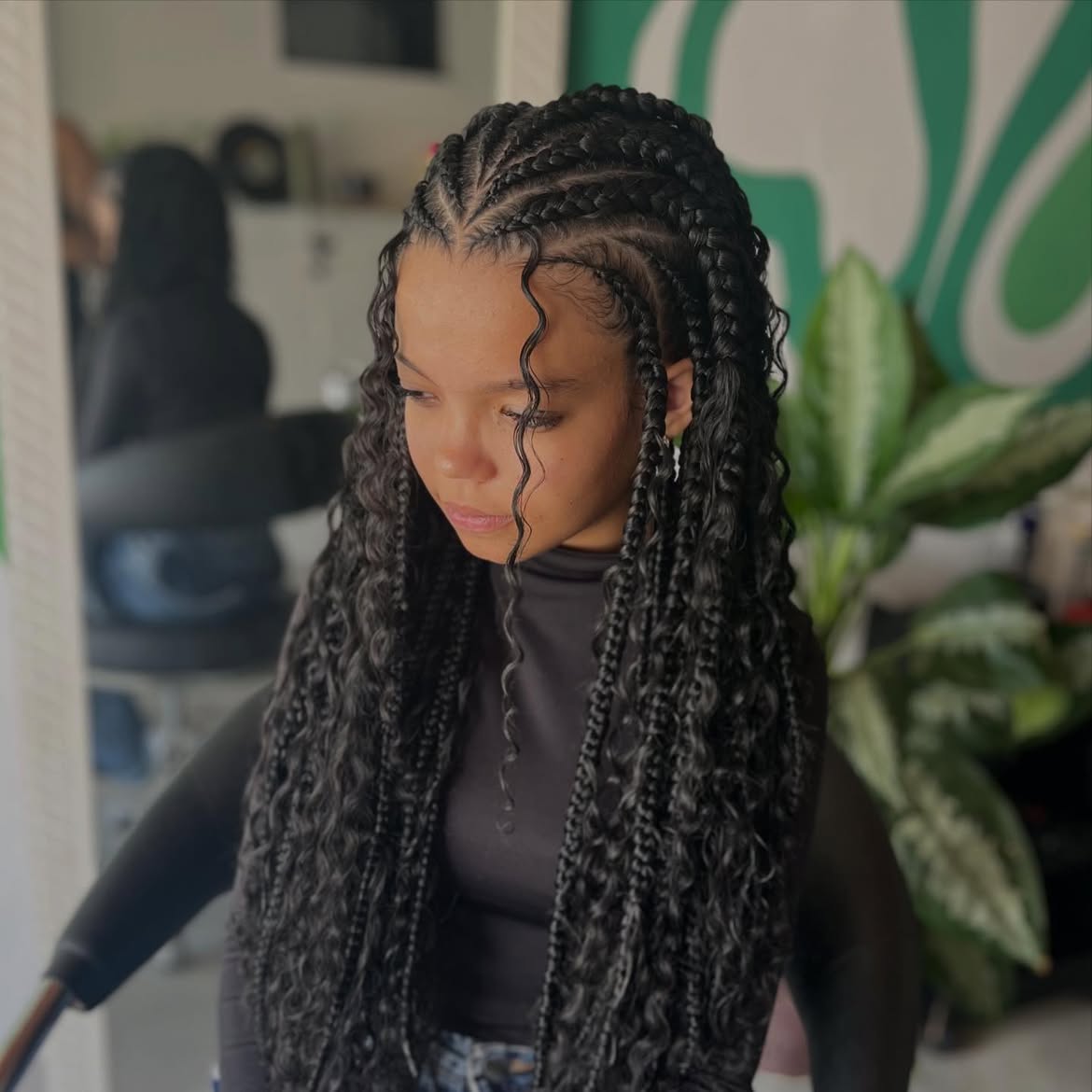 Glamorous Fulani Braids With Curly Tendrils
