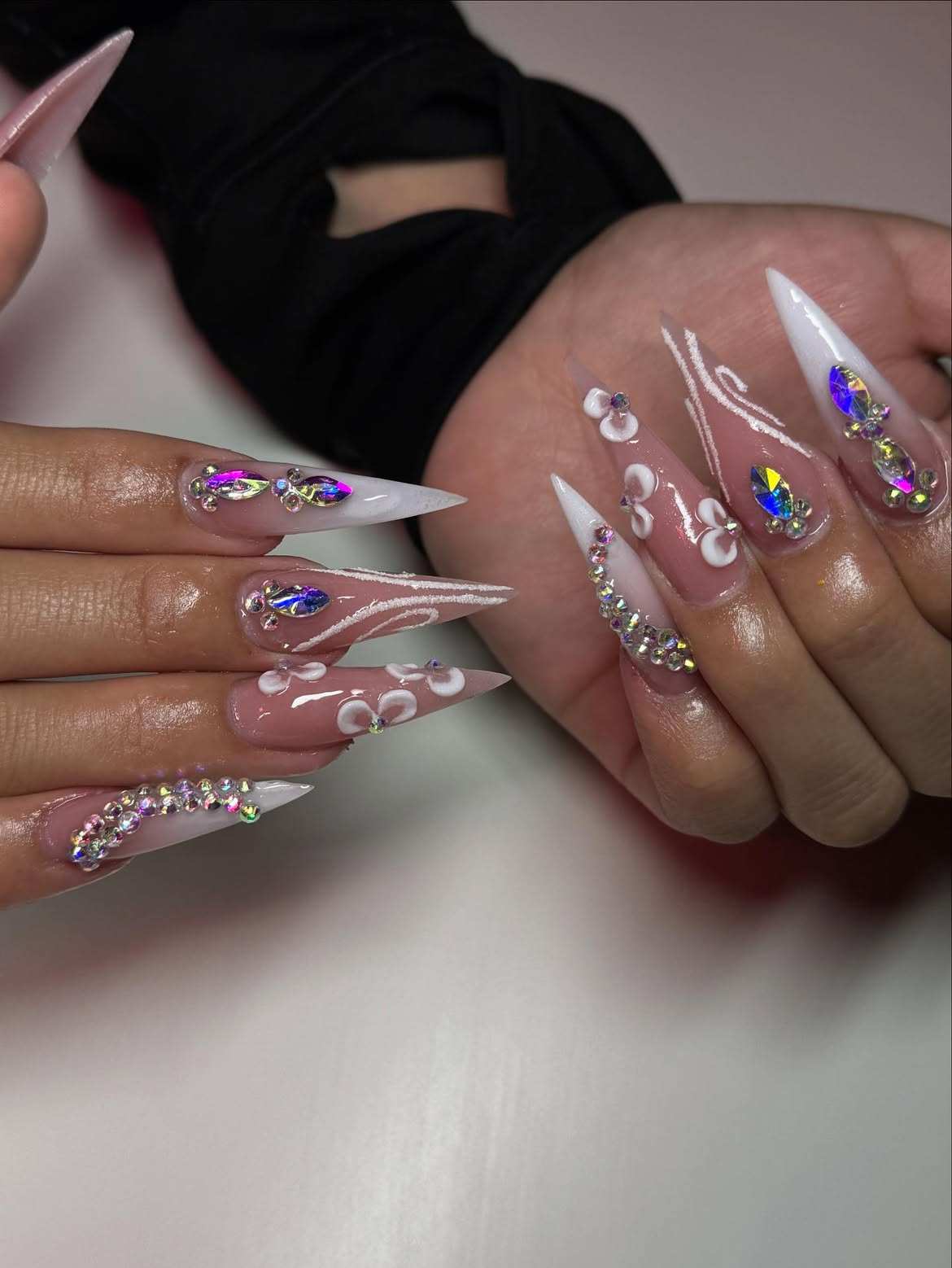 Glamorous Pink Ombre Stiletto Nails with Rhinestone Accents