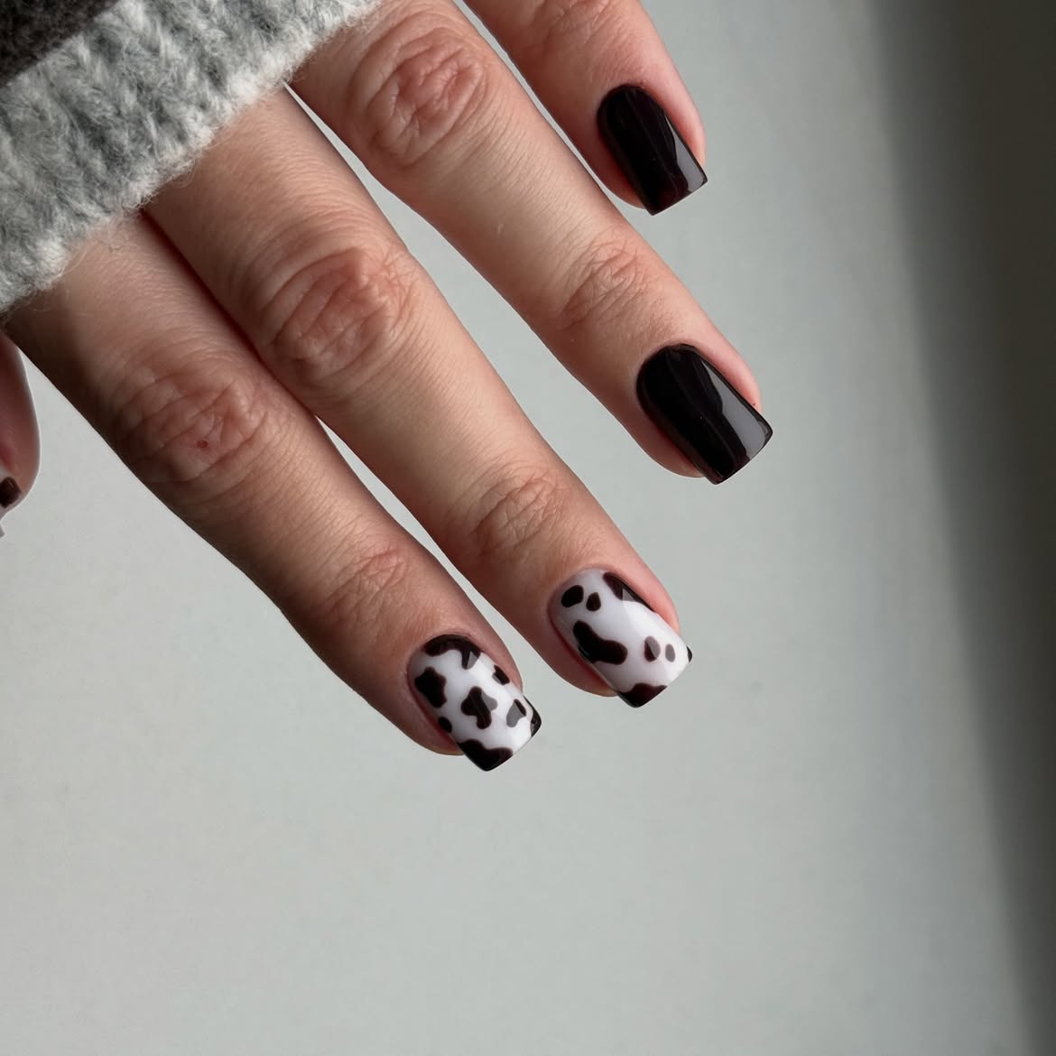 Glossy Black and Cow Print Square Nails