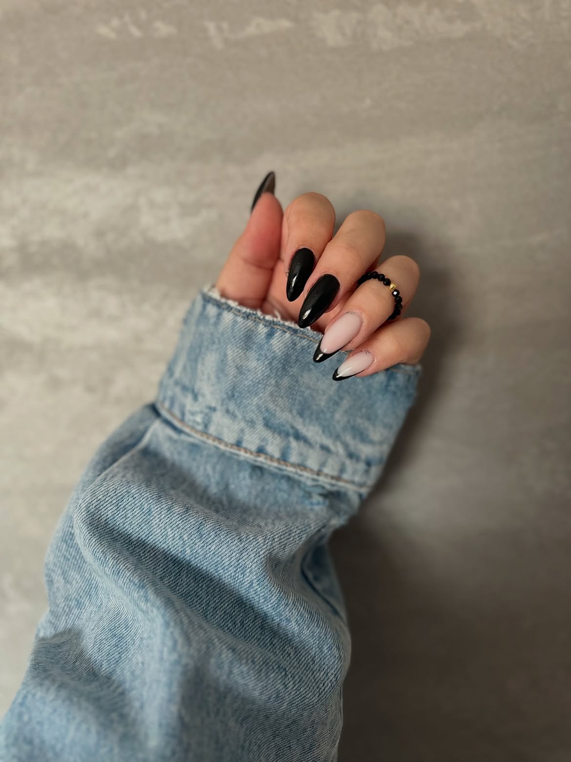 Glossy Black and Pink French Stiletto Nails