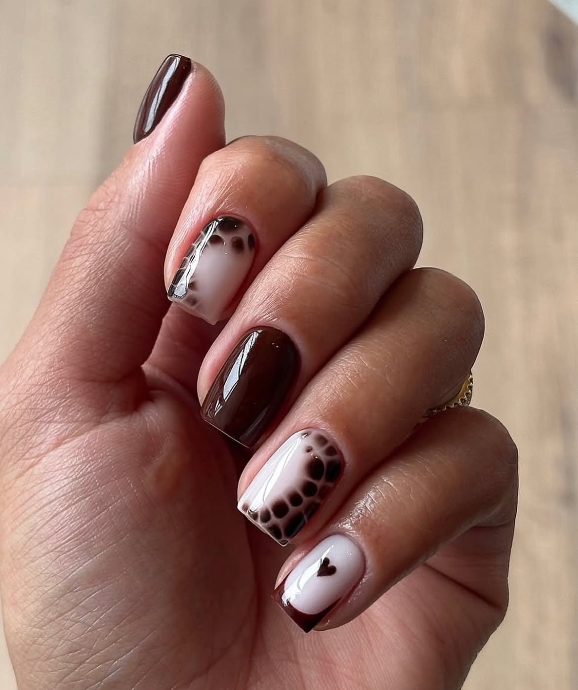 Glossy Chocolate & Cream Abstract Heart Nails