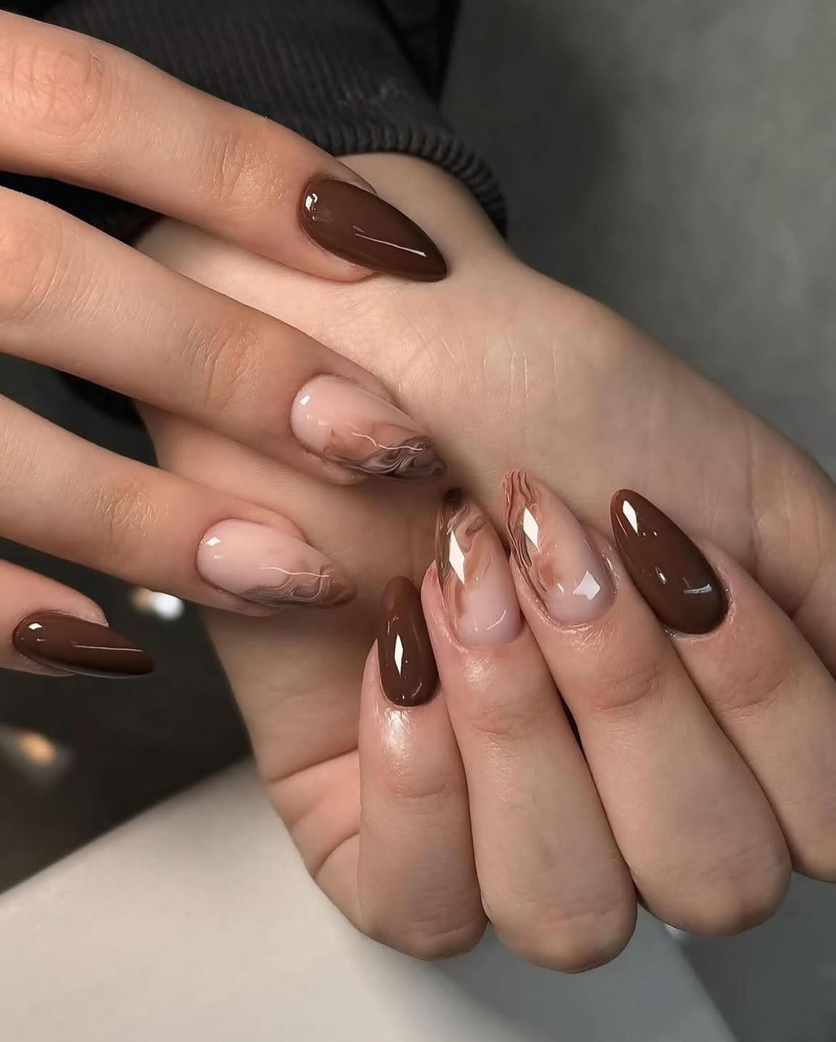 Glossy Chocolate Marble Almond Nails