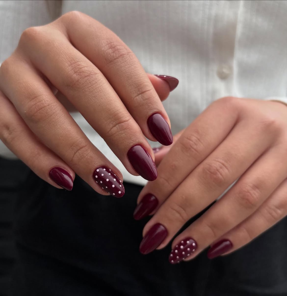 Glossy Deep Burgundy Polka Dot Almond Nails