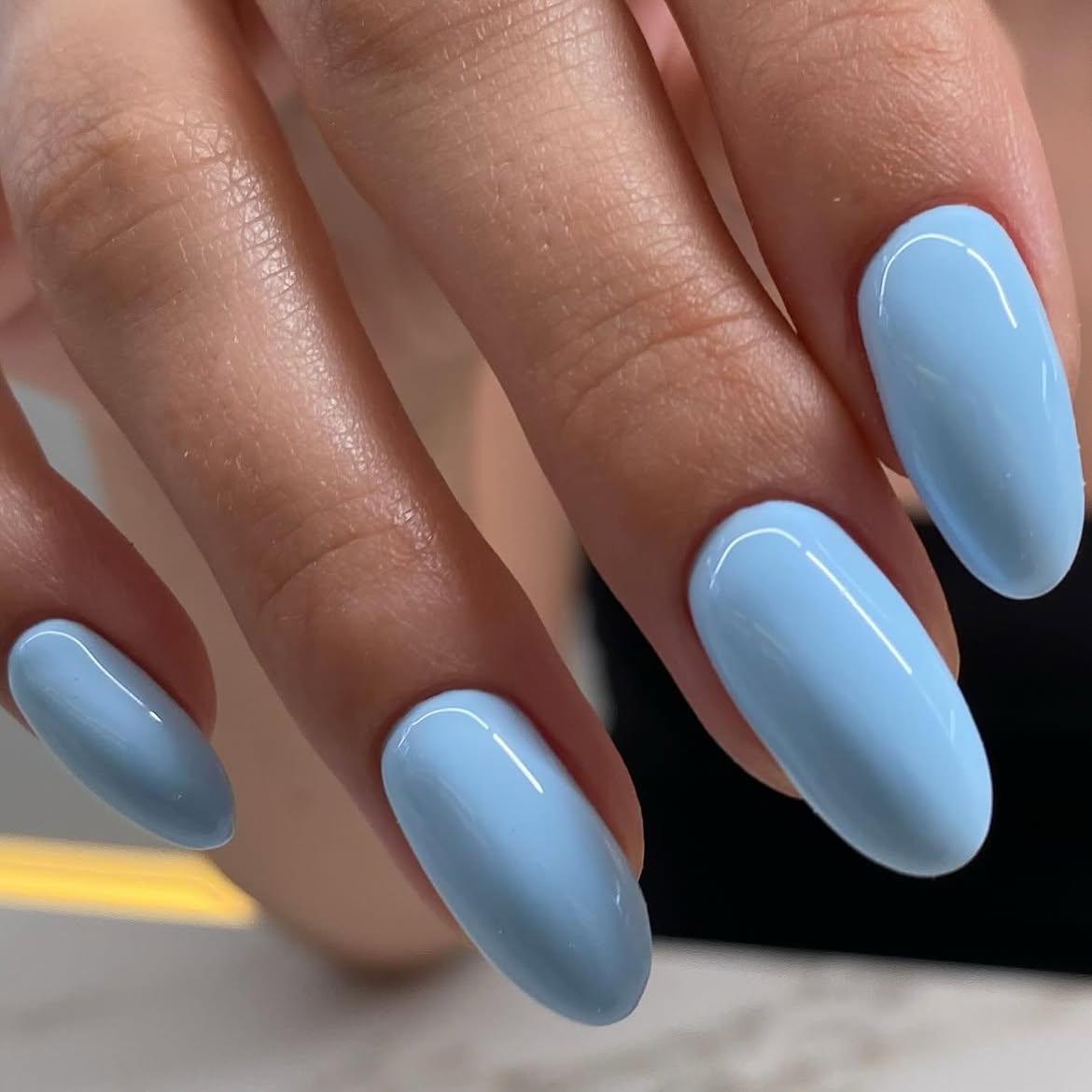 Glossy Sky Blue Oval Nails