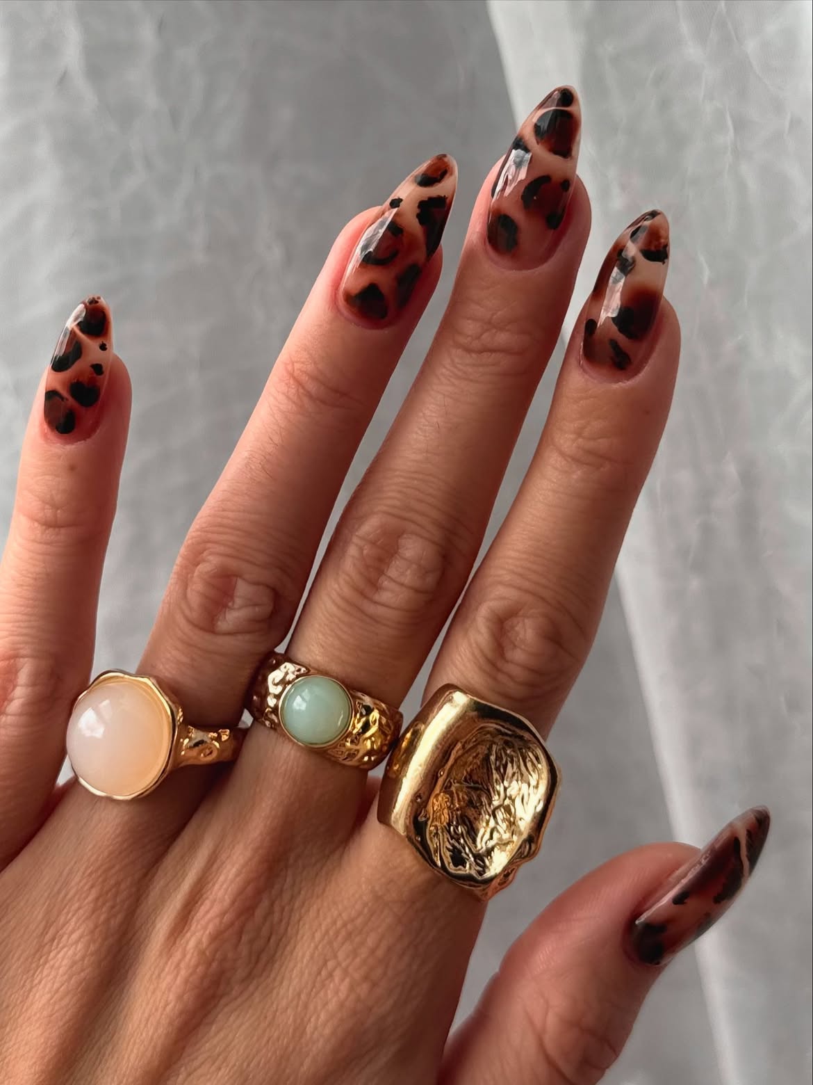 Glossy Tortoiseshell Almond Nails