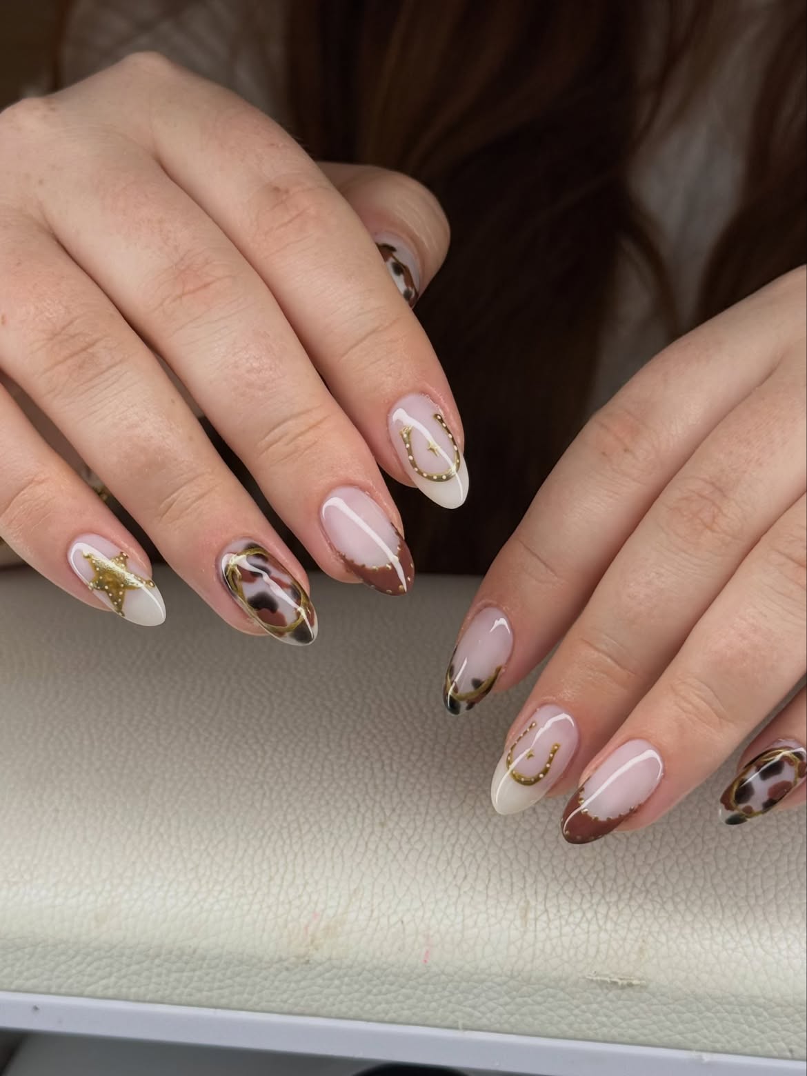 Golden Horseshoe French Tip Almond Nails