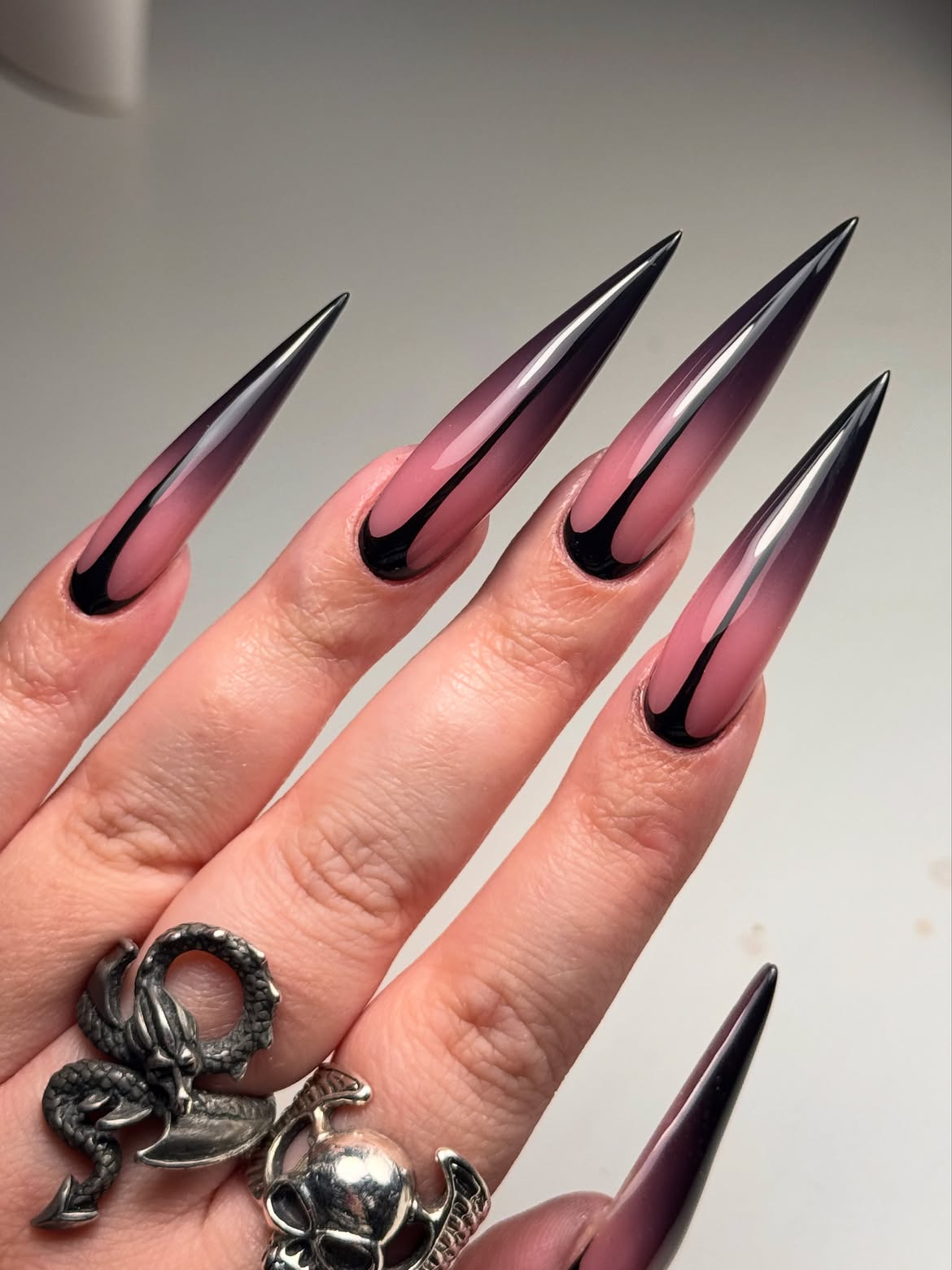 Gothic Black and Pink French Ombre Stiletto Nails