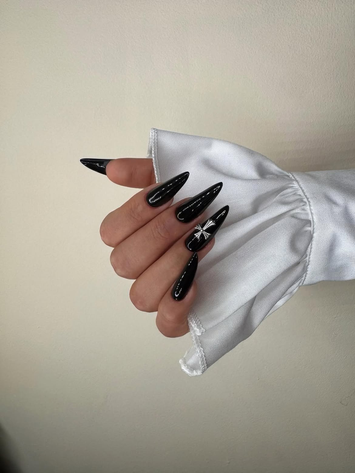 Gothic Black Stiletto Nails with Chrome Cross Charm