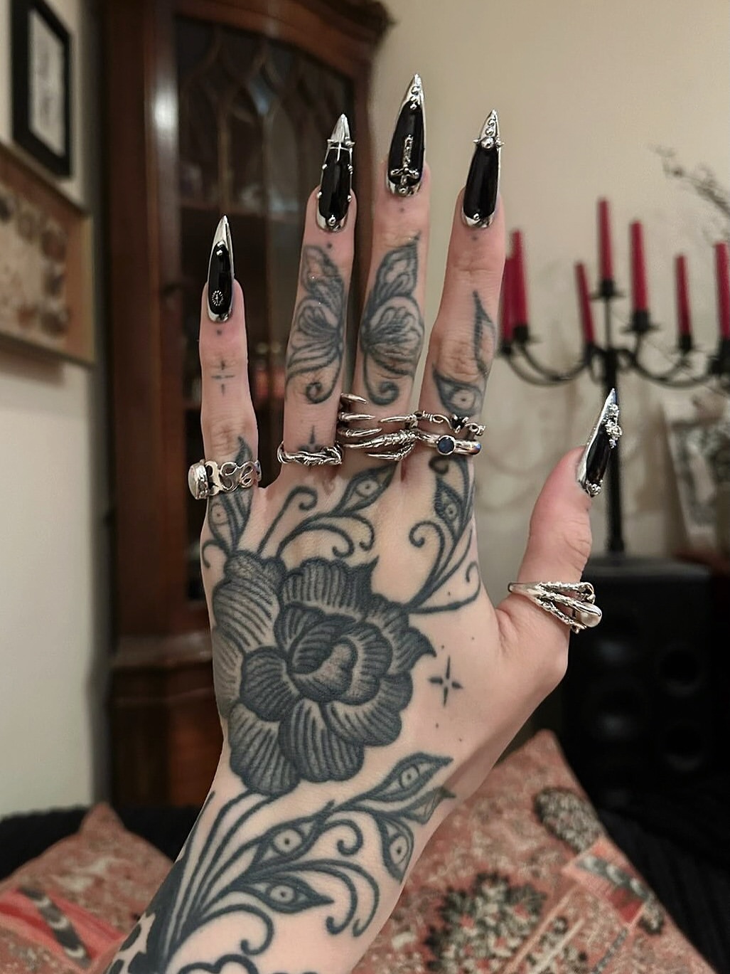 Gothic Black Stiletto Nails with Silver Embellishments