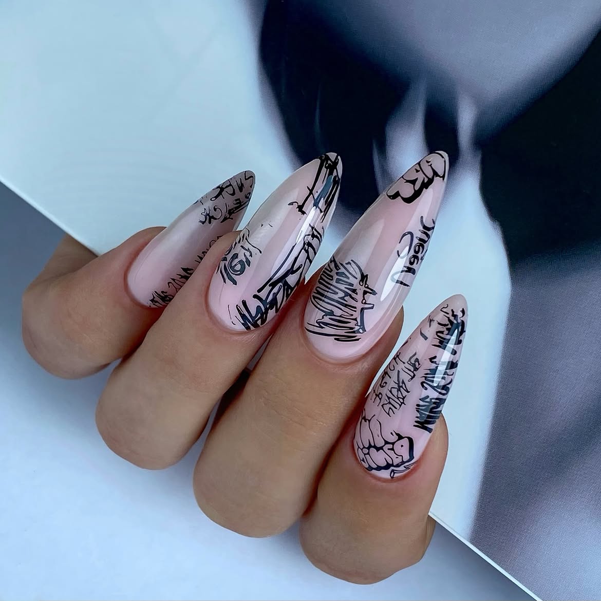 Graffiti Drip Stiletto Nails with Soft Pink Base