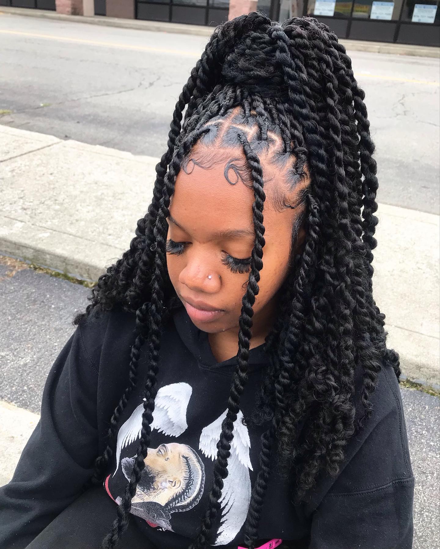 High Top Knot With Defined Coils And Baby Hairs