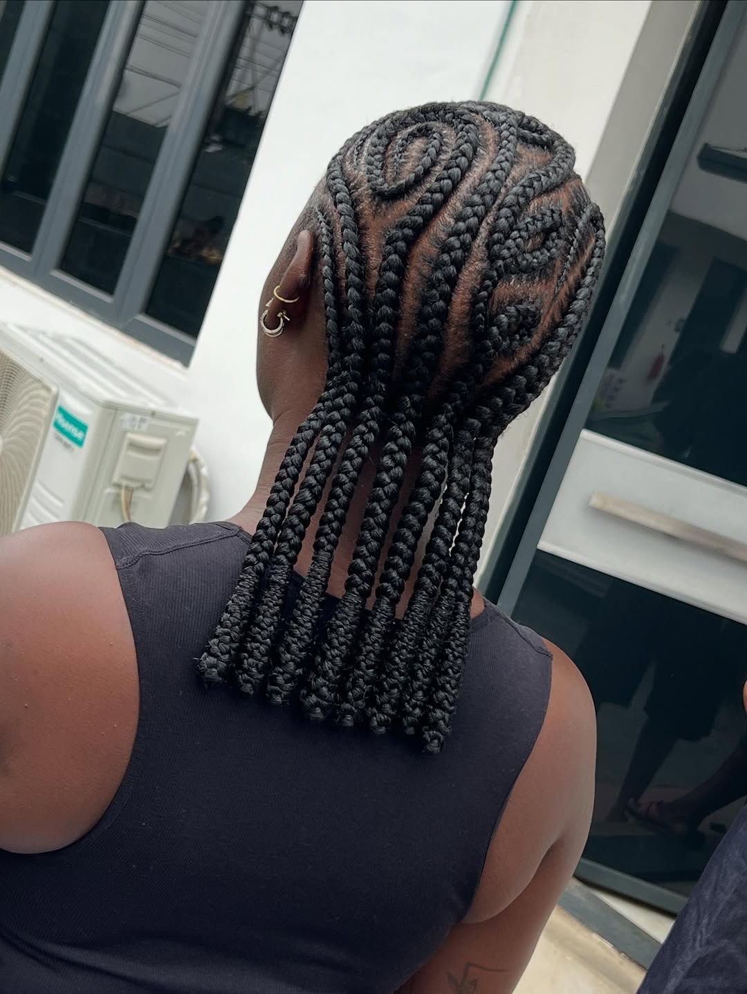 Intricate Cornrows With Heart Design Braids