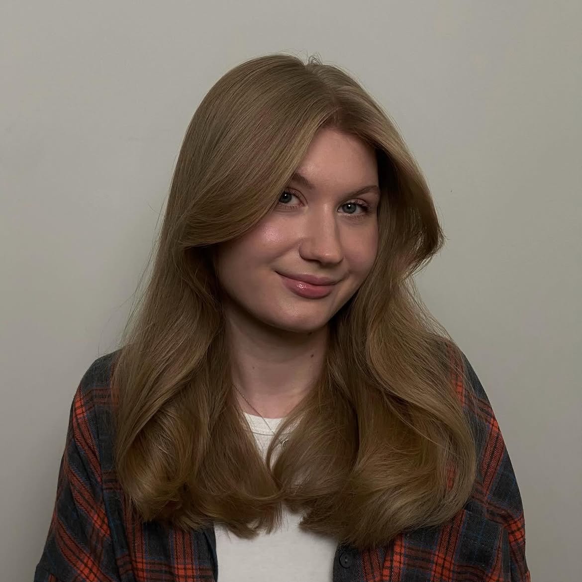 Layered Mid-Length Cut With Subtle Honey Blonde
