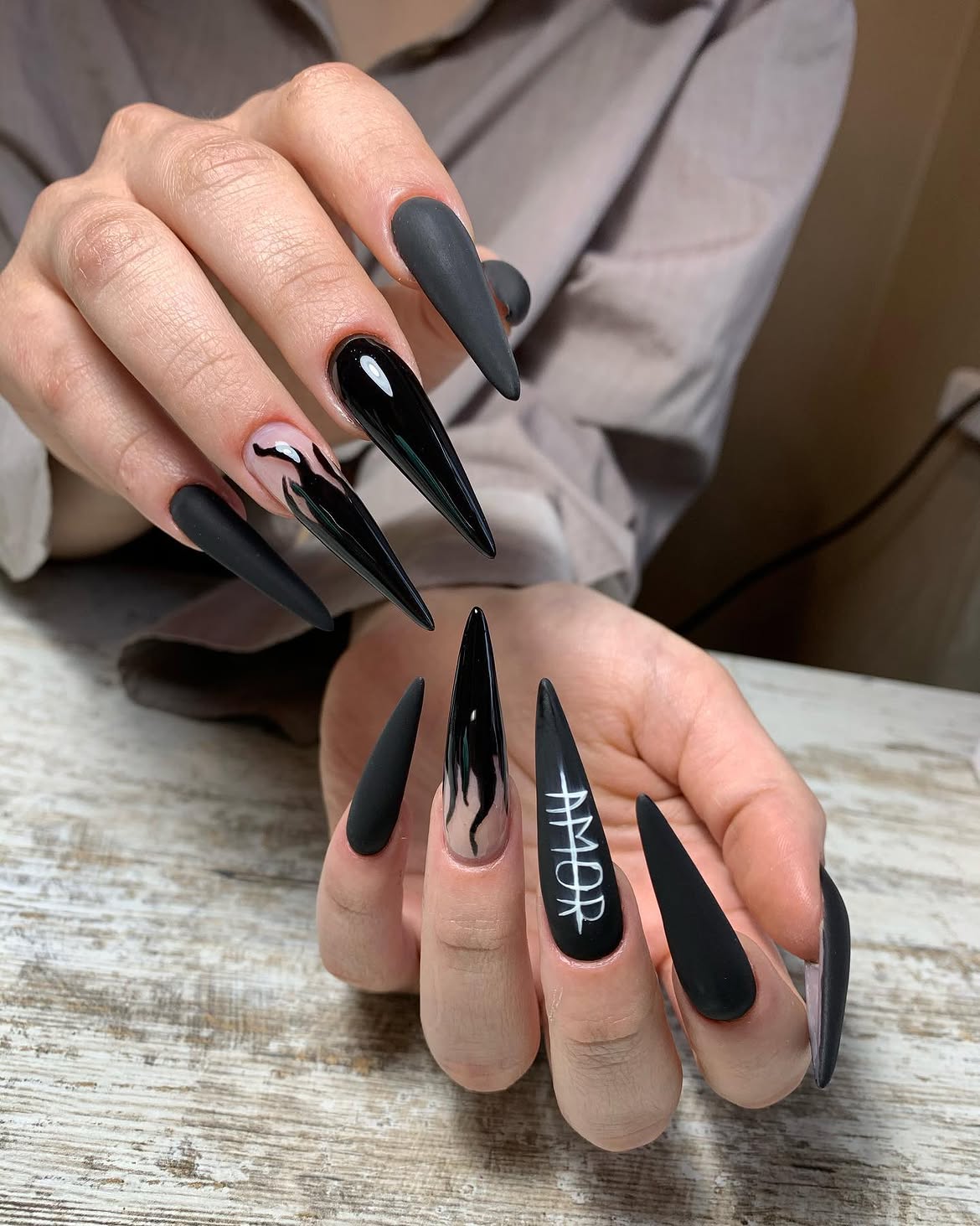 Matte Black Stiletto French Tip Nails with 'Amor'