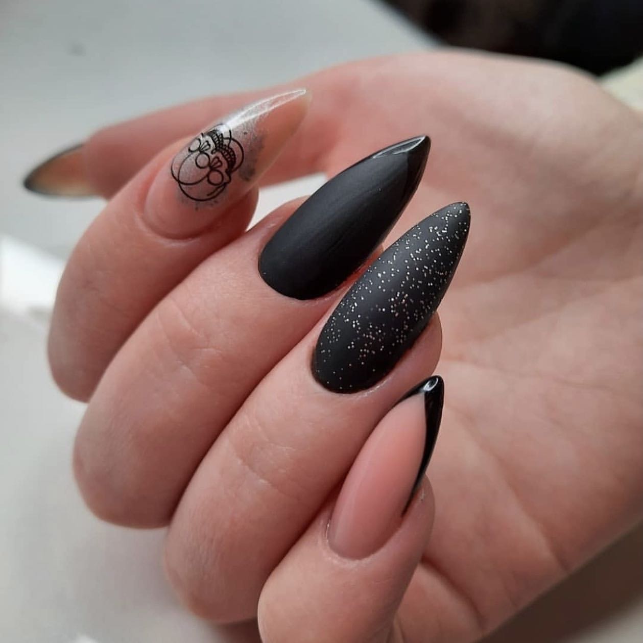 Matte Black Stiletto Nails with Glitter and Outline French