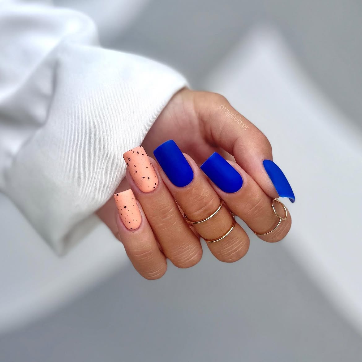 Matte Blue and Peach Specks Mismatched Nails