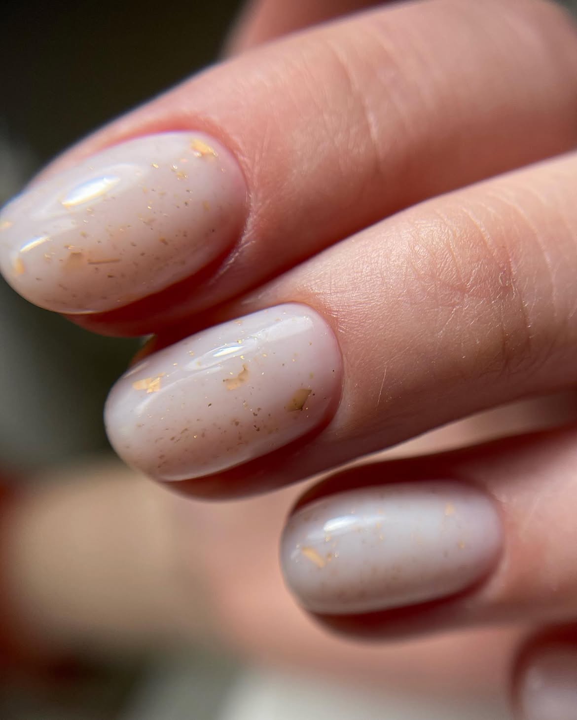 Milky White Oval Nails with Gold Flakes