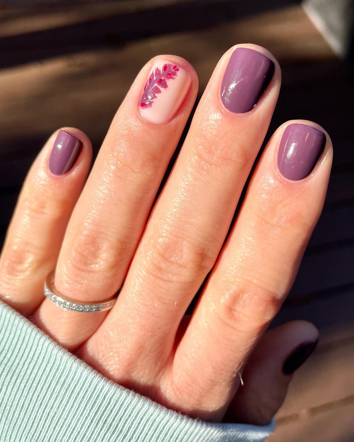 Muted Plum Glossy Nails with Botanical Accent