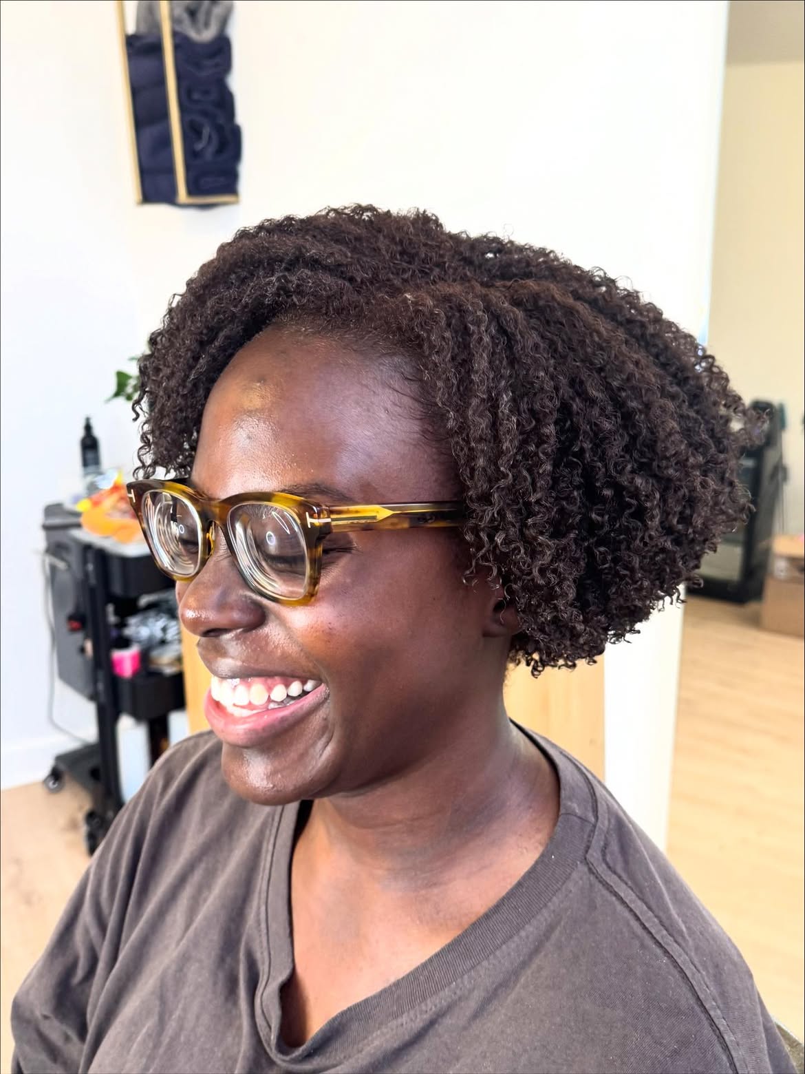 Natural Coily Bob With Subtle Auburn Highlights