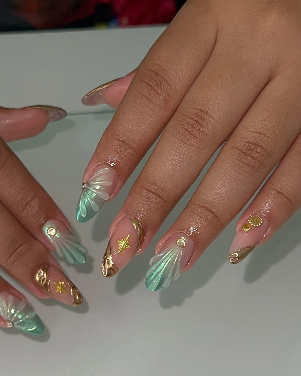 Oceanic Seashell Chrome Almond Nails