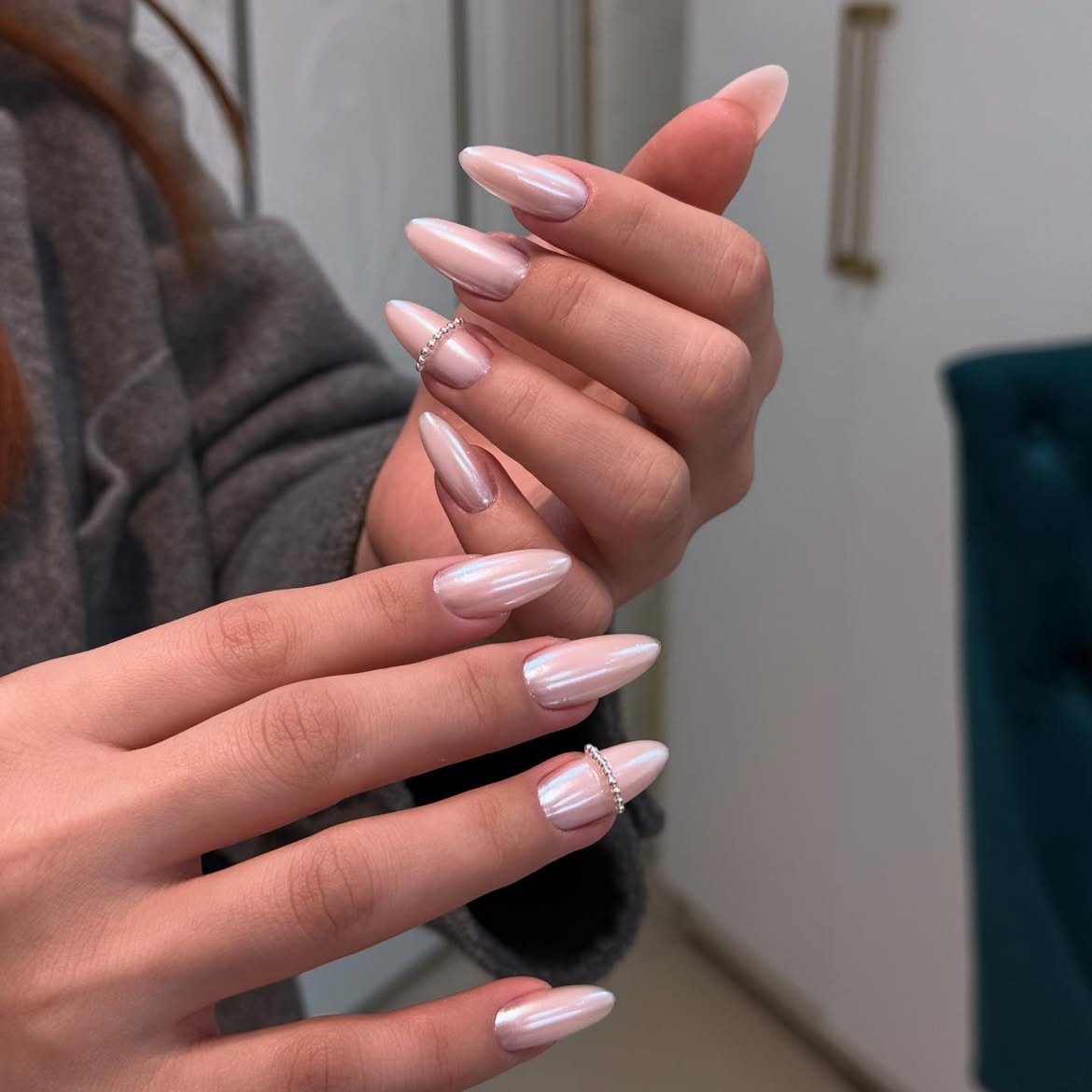 Pearl Almond Chrome Nails with Rhinestone Accents