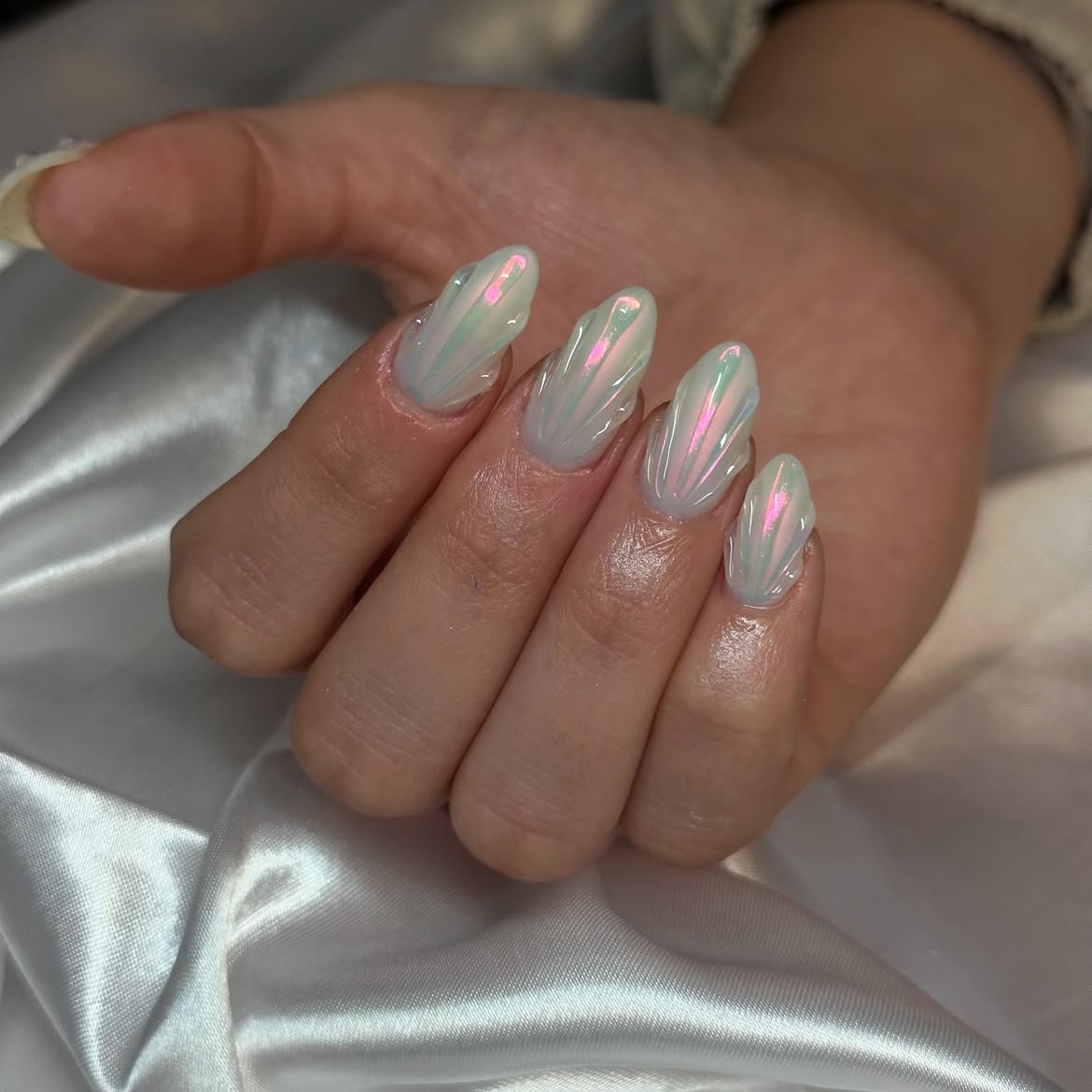 Pearl Shell Chrome Almond Nails