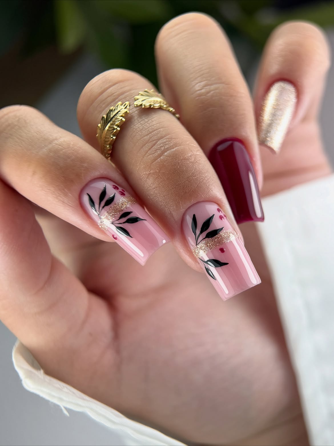 Pink Glossy Nails with Black Leaf Fall Art