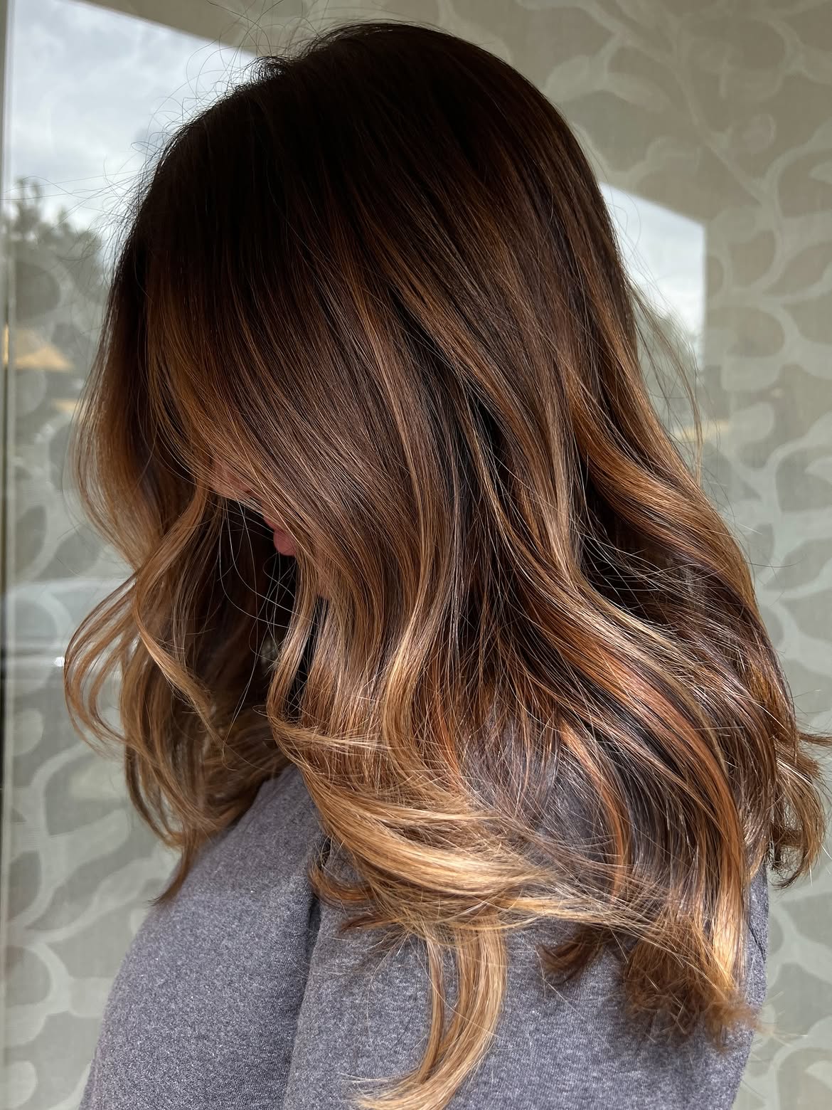 Rich Auburn Balayage With Soft Waves