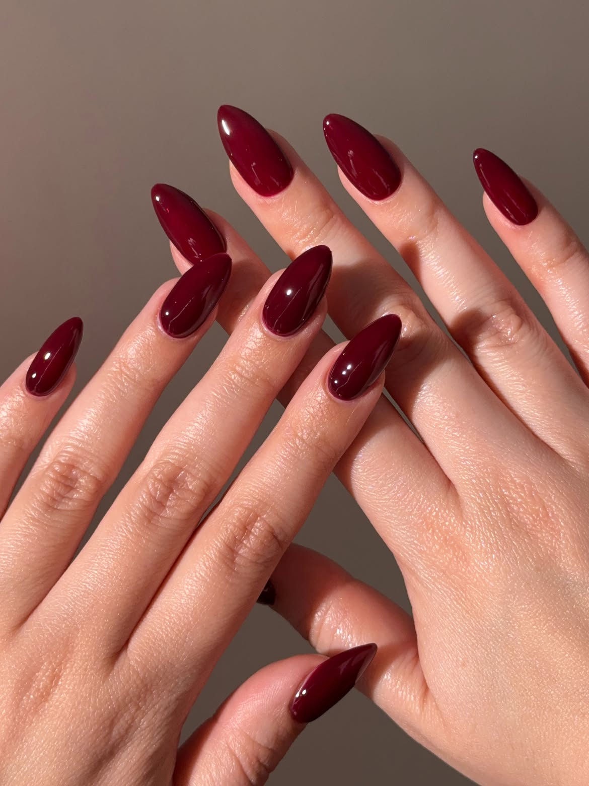 Rich Burgundy Glossy Almond Nails