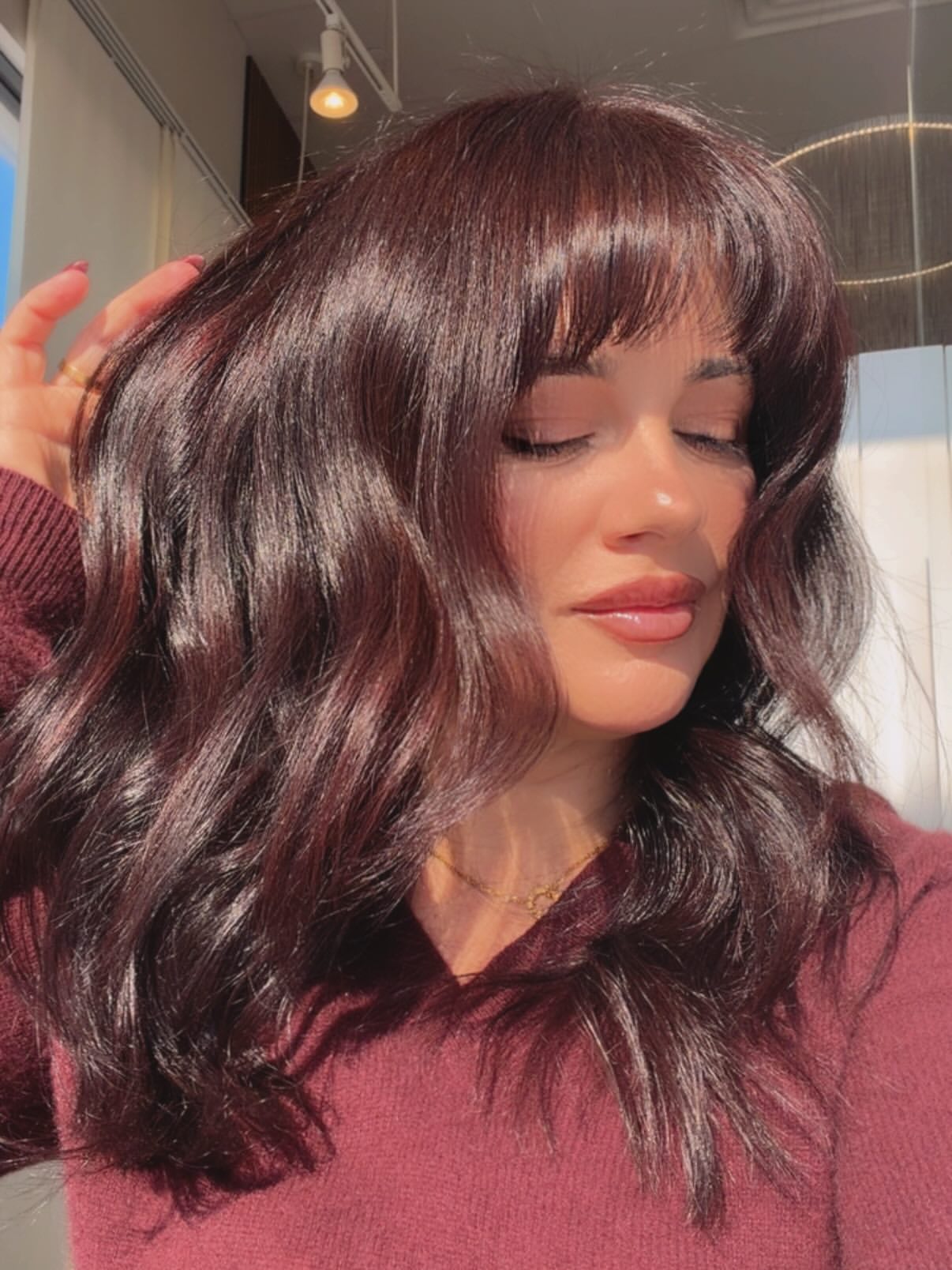 Rich Cherry Brown Waves With Soft Bangs