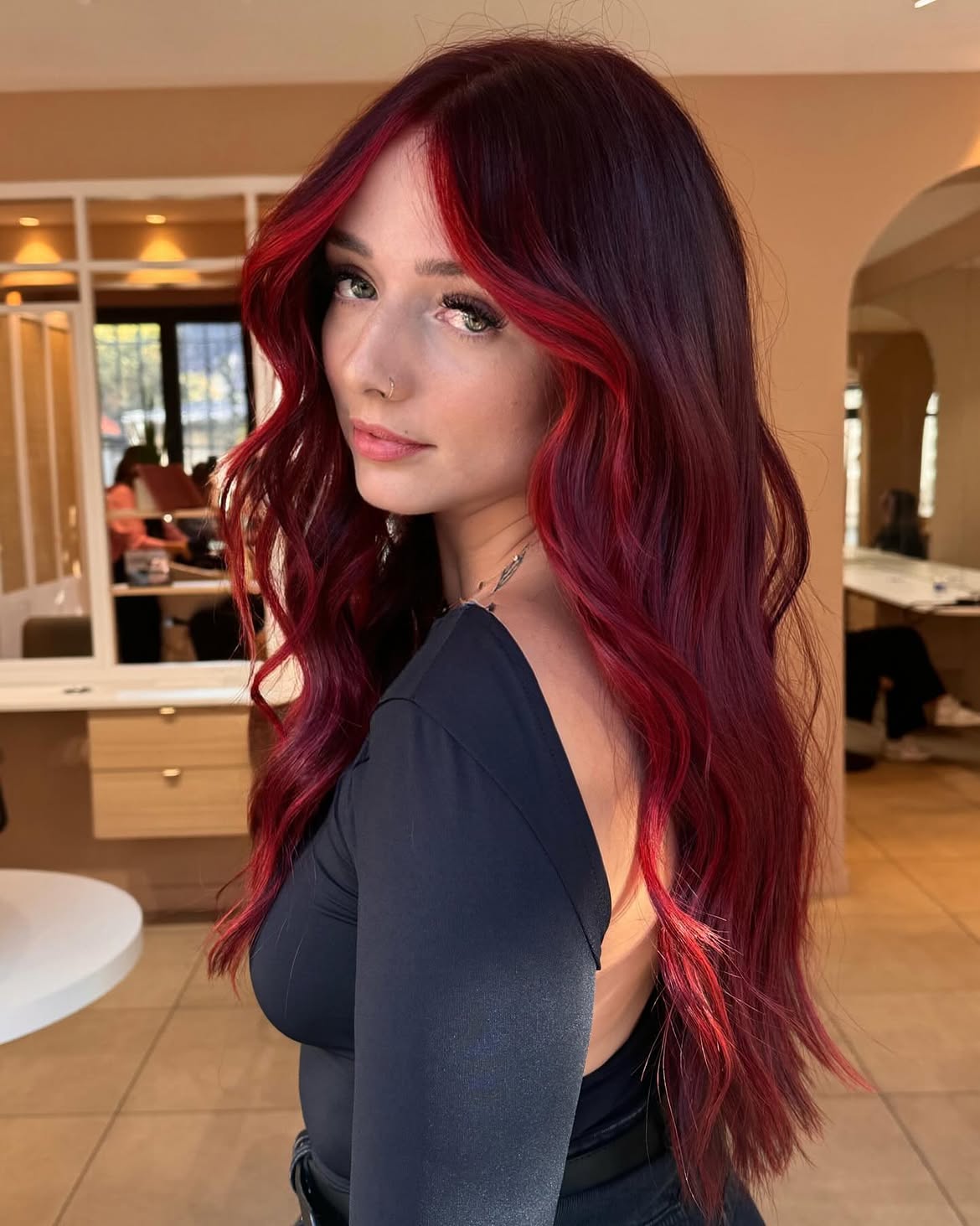 Rich Cherry Cola Hair with Face-Framing Highlights